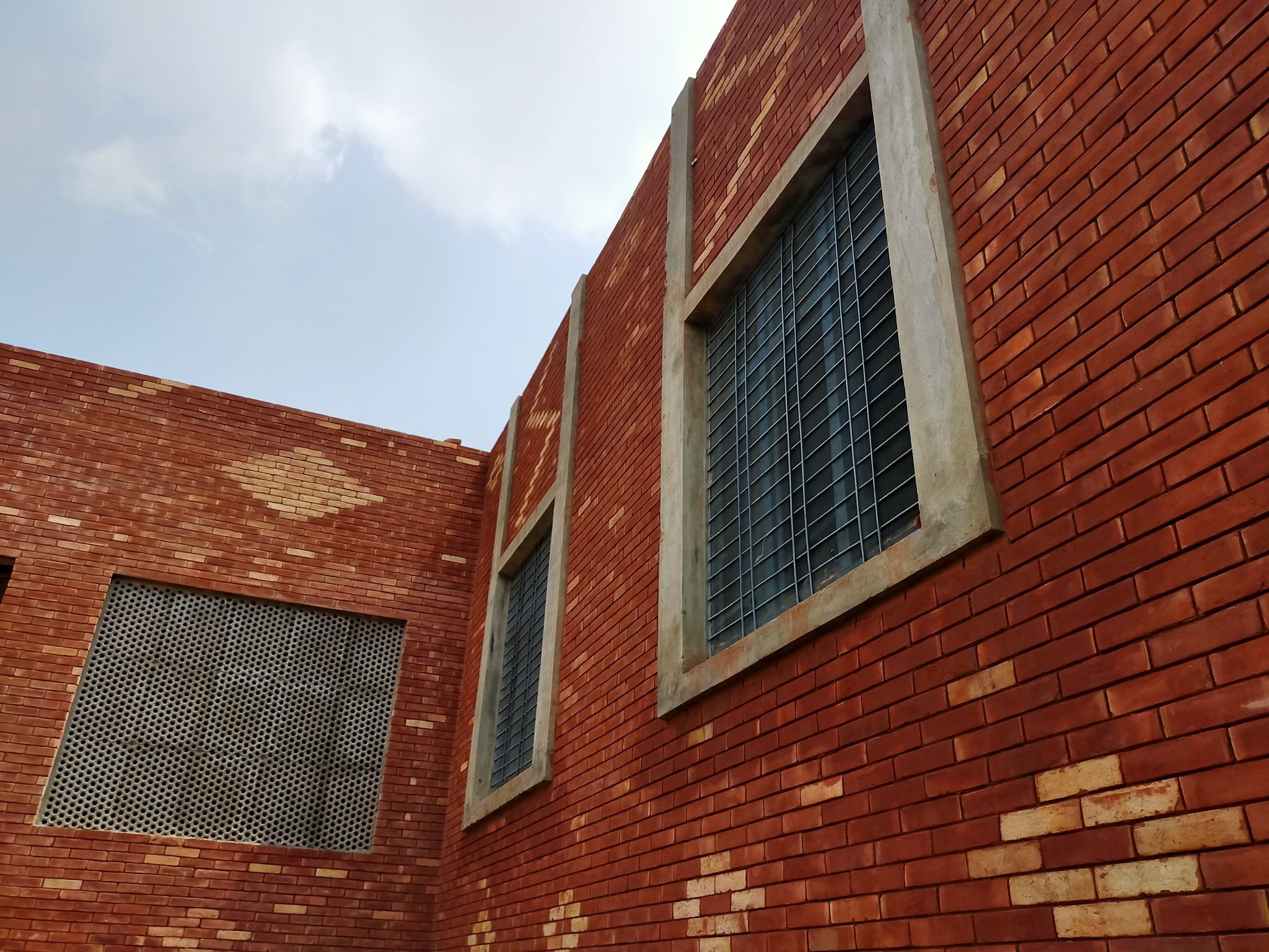 Red brick gutka tile designs in pakistan